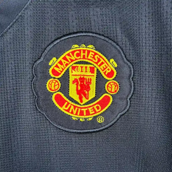 Camiseta Manchester United local 07/08 escudo
