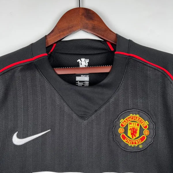 Camiseta Manchester United local 07/08 cuello